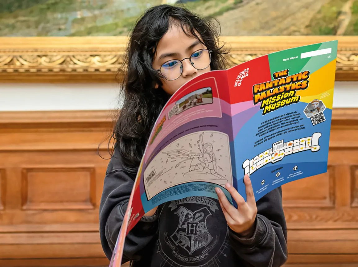 Kinder mit Game-Map im Museum