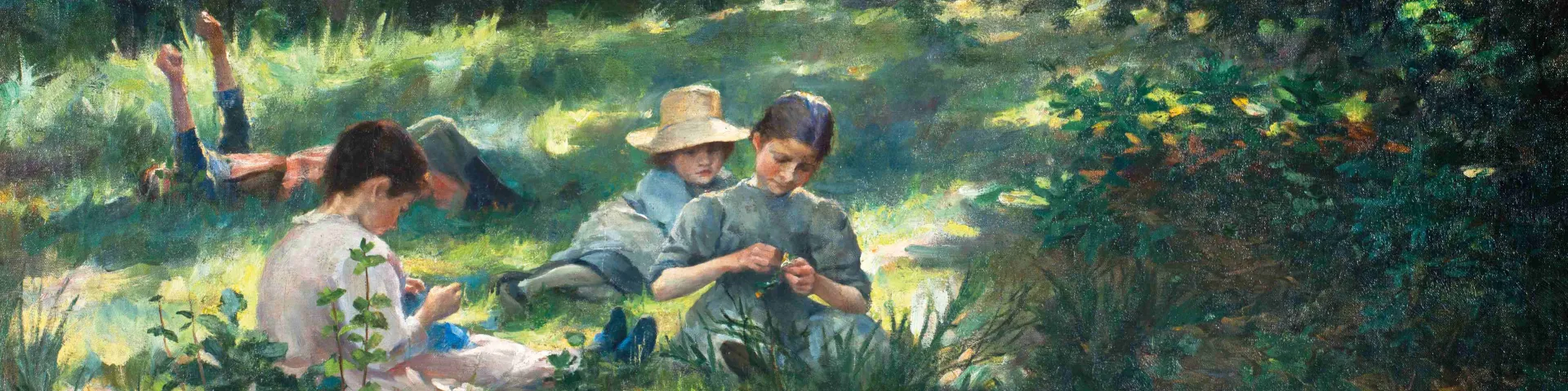 Kinder in grüner Wiese