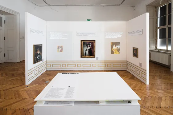 Paintings on a white wall